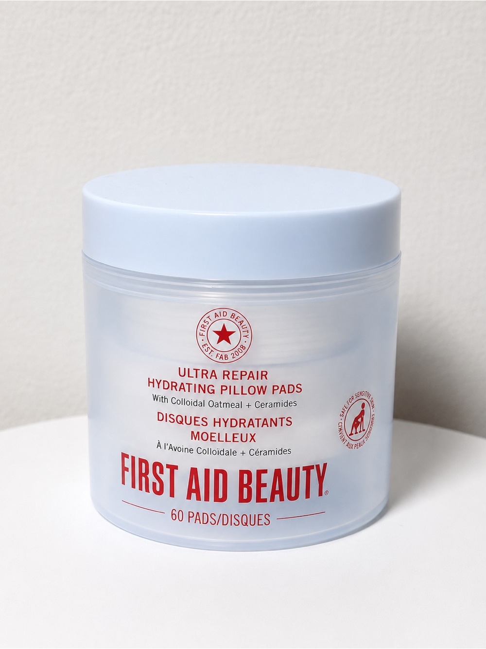 First Aid Beauty Hydrating Pillow Pads - Light Blue and Red Jar